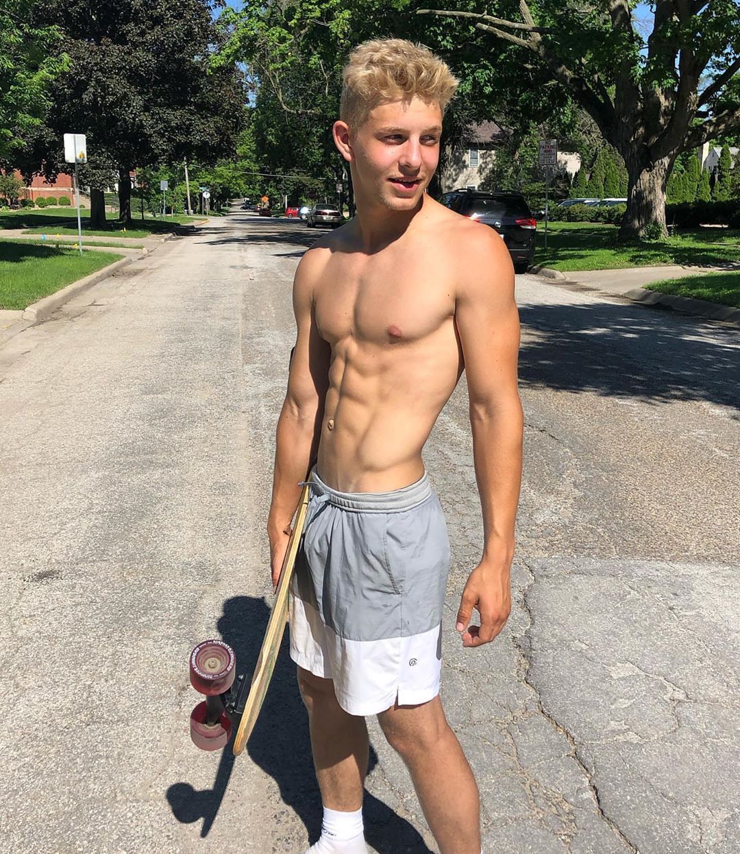 blonde-boy-skateboarding.jpeg