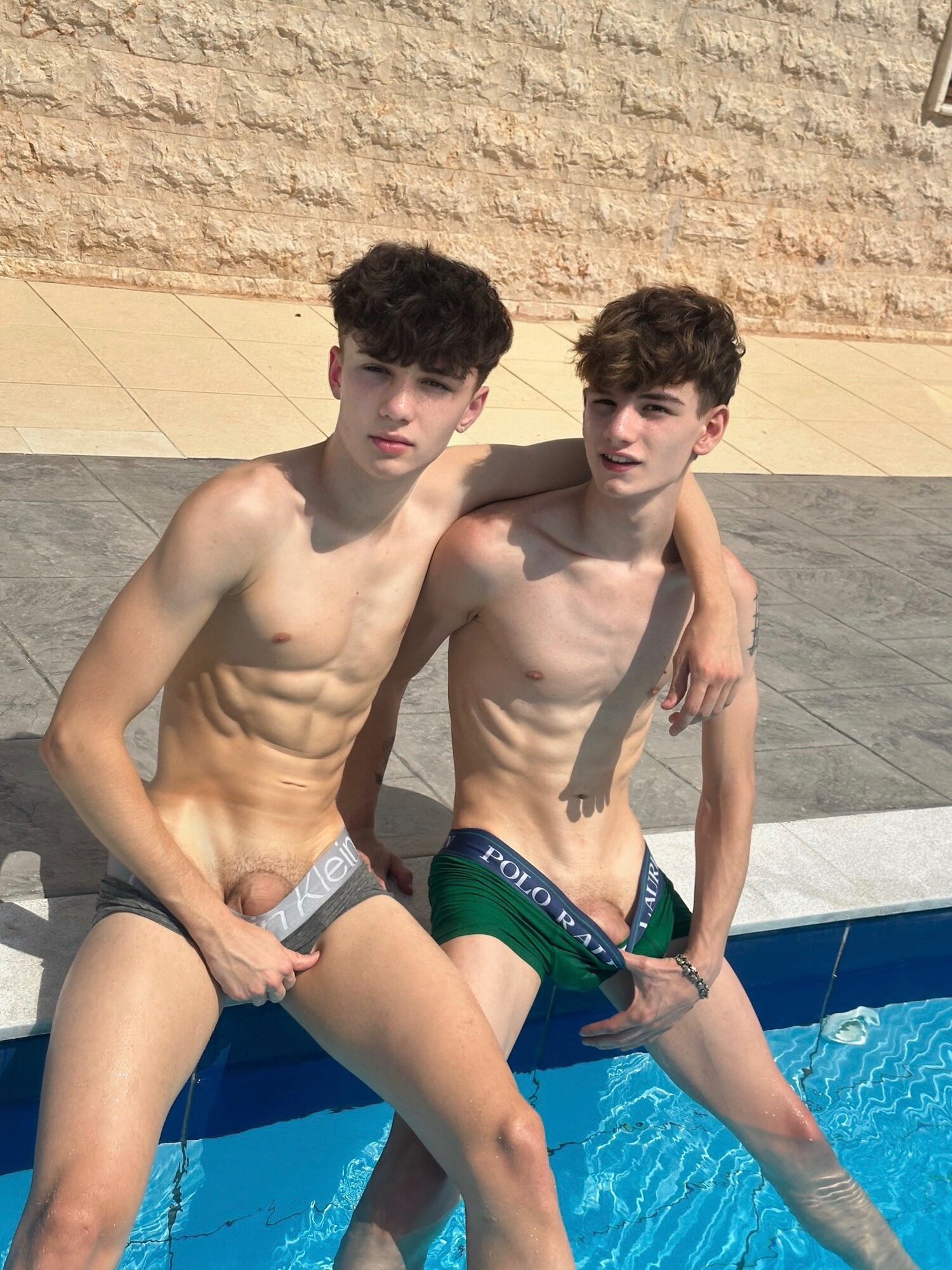 cute-brothers-at-the-pool-nude.jpeg