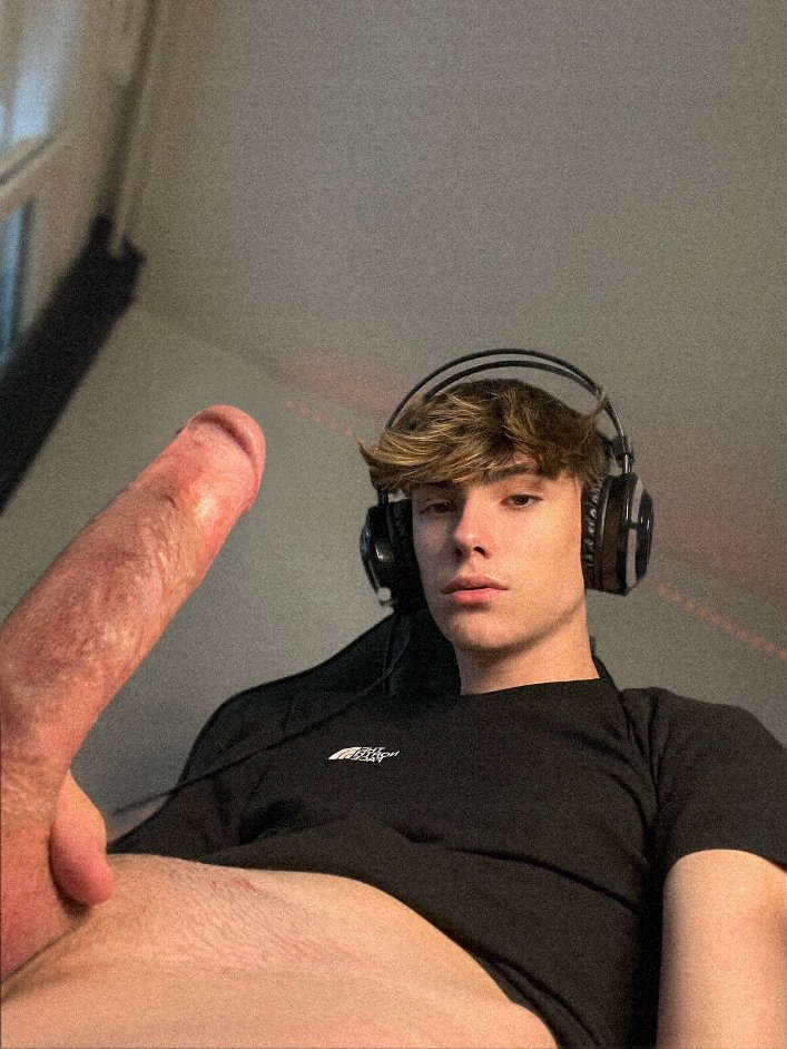 cute-guy-headphones-showing-his-cock.jpeg