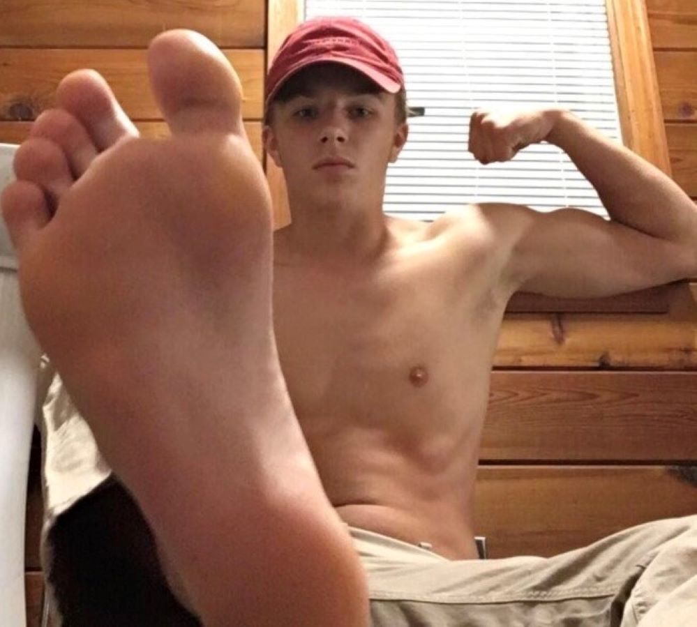 cute-shirtless-stud-showing-foot.jpeg