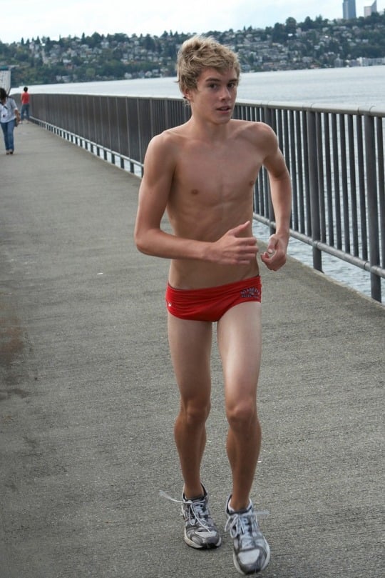 cute-teen-boy-running-red-shorts.jpeg