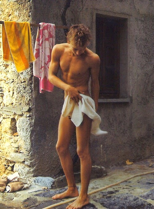 guy-showering-outside-feet.jpg