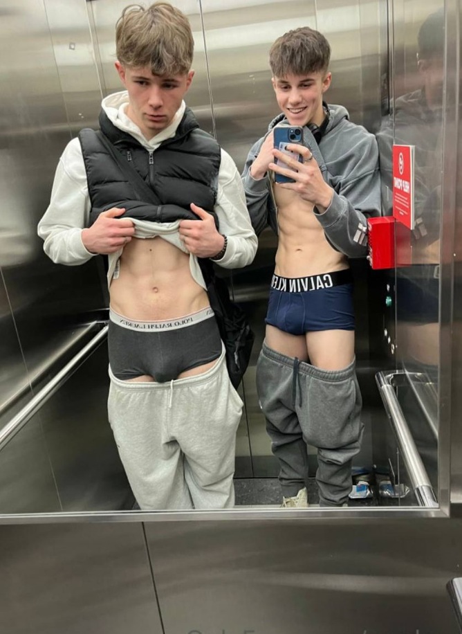 guys-in-elevator-stripping.jpeg