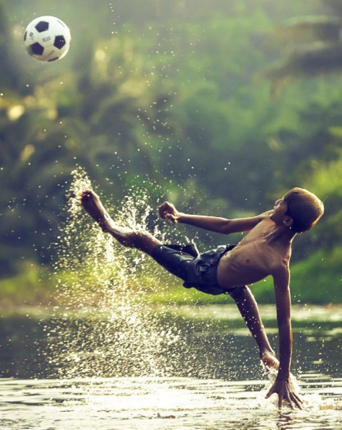 kiciking-soccer-ball-in-water.jpeg