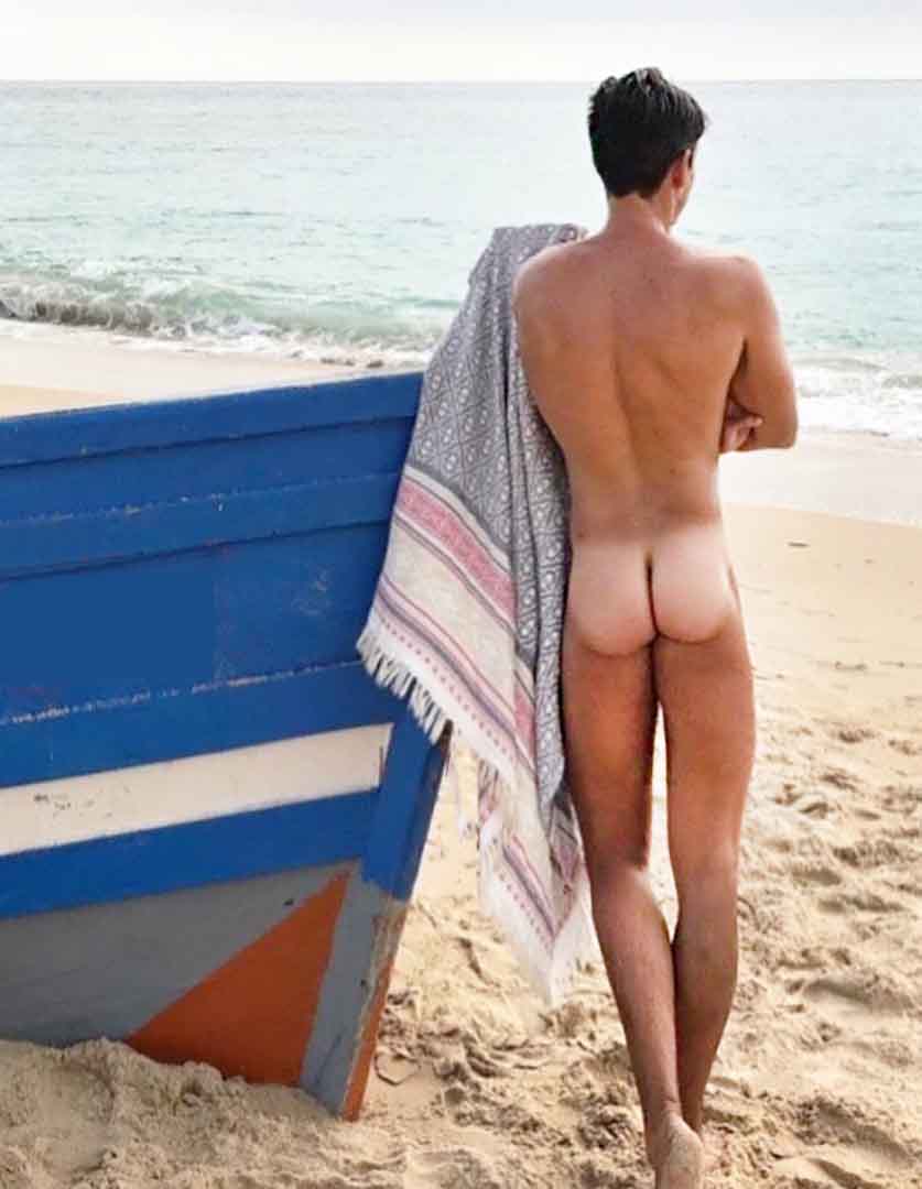 naked-guy-at-beach.jpeg