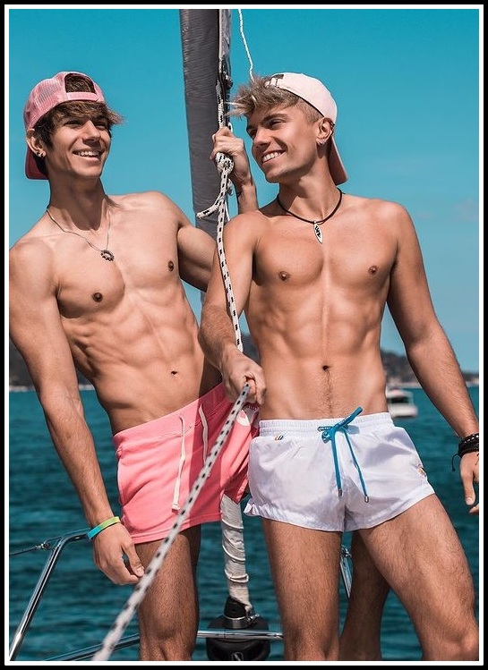 two-ripped-guys-on-boat.jpg