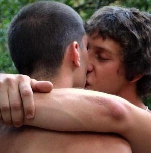 Damien and Paul kissing.jpg