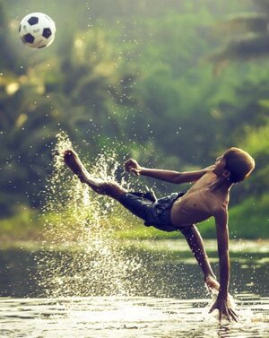 kiciking-soccer-ball-in-water.jpeg