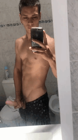 cute-guy-taking-video-selfie-in-mirror.gif