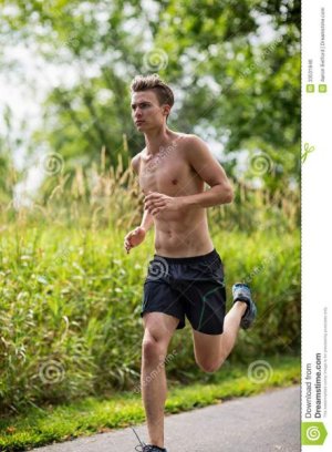 young-man-jogging-handsome-road-33531846.jpg
