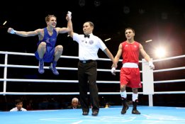 25 Michael Conlan of Ireland celebrates his win over Nordine Oubaali.jpg